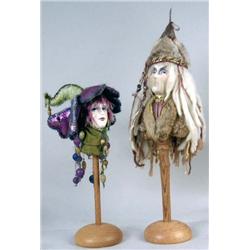 TWO COMPOSITION AND MIXED MEDIA BUSTS ON A WOOD BASE