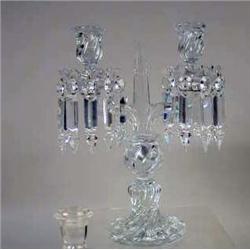 A COLORLESS GLASS TWO-ARM CANDLESTICK