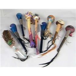 A GROUP OF MIXED MEDIA RATTLES