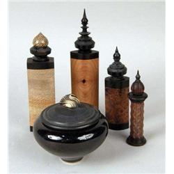 A GROUP OF FOUR CARVED WOOD PERFUME BOTTLES