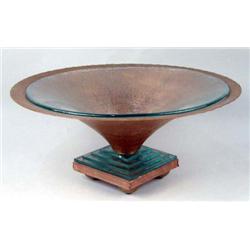 A FOOTED COPPER COMPOTE