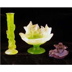 A GROUP OF THREE COLORED GLASS TABLE ARTICLES