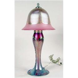 A PINK IRIDESCENT ART GLASS TABLE LAMP
