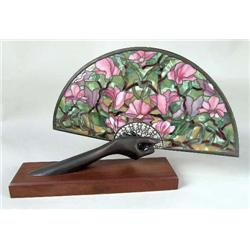 A PATINATED METAL SCULPTURE OF A WOMAN`S HAND