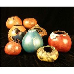 AN ASSORTED GROUP OF HANDPAINTED POLYCHROME-DECORATED GOURDS
