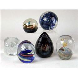 A GROUP OF SIX ASSORTED PAPERWEIGHTS