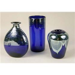 A GROUP OF THREE COBALT IRIDESCENT ART GLASS VASES
