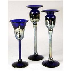 TWO IRIDESCENT COBALT GLASS CANDLESTICKS