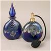 Image 1 : A GROUP OF TWO COBALT AND IRIDESCENT GLASS PERFUME BOTTLES