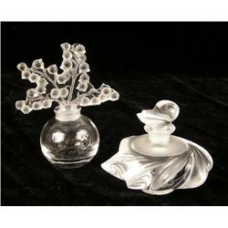 TWO COLORLESS GLASS PERFUME BOTTLES