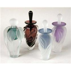 A GROUP OF FOUR FROSTED GLASS PERFUME BOTTLES