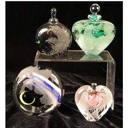 A GROUP OF THREE GLASS PERFUME BOTTLES
