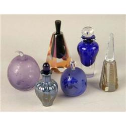 A GROUP OF SIX GLASS PERFUME BOTTLES