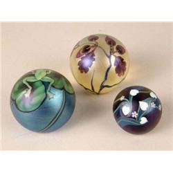 A GROUP OF THREE PAPERWEIGHTS