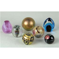 A GROUP OF SEVEN PAPERWEIGHTS