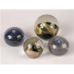 A GROUP OF FOUR PAPERWEIGHTS