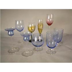 AN ASSEMBLED GROUP OF BLUE AND COLORLESS GLASS STEMWARE