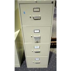 A GROUP OF THREE TALL FILING CABINETS