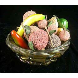 AN AMBER COLORED GLASS CENTERPIECE BOWL