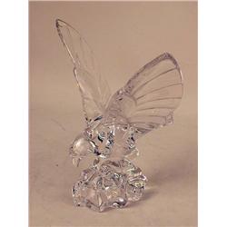 A COLORLESS GLASS EAGLE FORM SCULPTURE