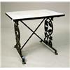 Image 1 : A BLACK-PAINTED MARBLE-INSET CAST-IRON SIDE TABLE