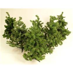 A GROUP OF SIX DECORATIVE ARTIFICIAL TREES