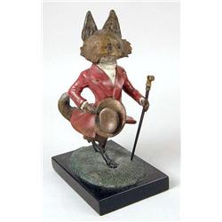 A PATINATED POLYCHROME DECORATED BRONZE FOX SCULPTURE