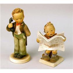 TWO CERAMIC POLYCHROME DECORATED FIGURES OF BOYS