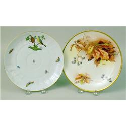 TWO PORCELAIN POLYCHROME AND PARCEL-GILT DECORATED PLATES