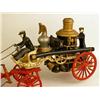 Image 3 : A CAST IRON POLYCHROME PAINT-DECORATED FIRE PUMPER TOY