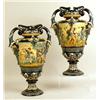 Image 1 : A PAIR OF FOOTED HANDLED POLYCHROME DECORATED MAJOLICA URNS
