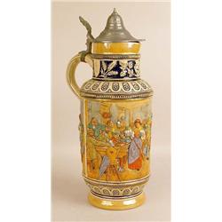 A GLAZED CERAMIC BEER STEIN