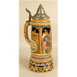 A GLAZED CERAMIC BEER STEIN