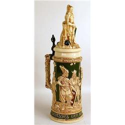 A GLAZED CERAMIC BEER STEIN