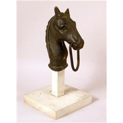 A BLACK CAST IRON HORSE HEAD FORM HITCHING POST FIGURE