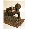 Image 2 : A CAST BRONZE SCULPTURE OF A RECUMBENT NATIVE AMERICAN