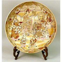 A SATSUMA POLYCHROME-DECORATED AND PARCEL-GILT PORCELAIN CHARGER