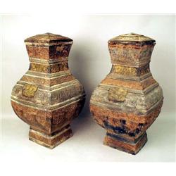 A PAIR OF BALUSTER-FORM POLYCHROME-DECORATED POTTERY COVERED JARS