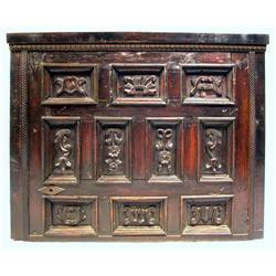 A CARVED AND PATINATED OAK ARCHITECTURAL ELEMENT