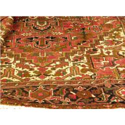 AN ORIENTAL RUG
