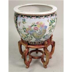 AN ORIENTAL FISH BOWL