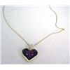 Image 1 : A TIFFANY & CO 18K YELLOW GOLD RUBY AND DIAMOND HEART-FORM PENDANT