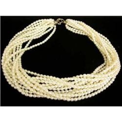 A PALOMA PICASSO FOR TIFFANY & CO TWELVE STRAND FRESHWATER PEARL TORSADE NECKLACE