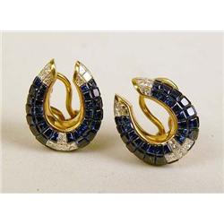 A PAIR OF 18K YELLOW GOLD CARVED SAPPHIRE AND DIAMOND HORSE-SHOE FORM EARRINGS