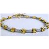 Image 2 : A 14K YELLOW GOLD WHITE GOLD DIAMOND AND YELLOW SAPPHIRE LINE BRACELET