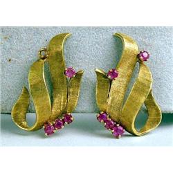 A PAIR OF 14K BRUSHED YELLOW GOLD AND RUBY RIBBON FORM EAR CLIPS