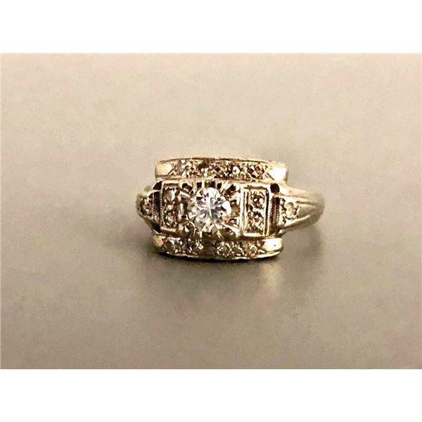 Gold and Diamond Ring- .50 Ct. Center Diamond