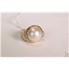Image 1 : 10kt yellow gold, pearl and diamond ring set with 13.75mm Mabe pearl and .10ct of round white diamon
