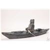 Image 2 : Inuit carved hunter in his kayak with bone paddle signed Siasi Amm and numbered 12219, 13" in length