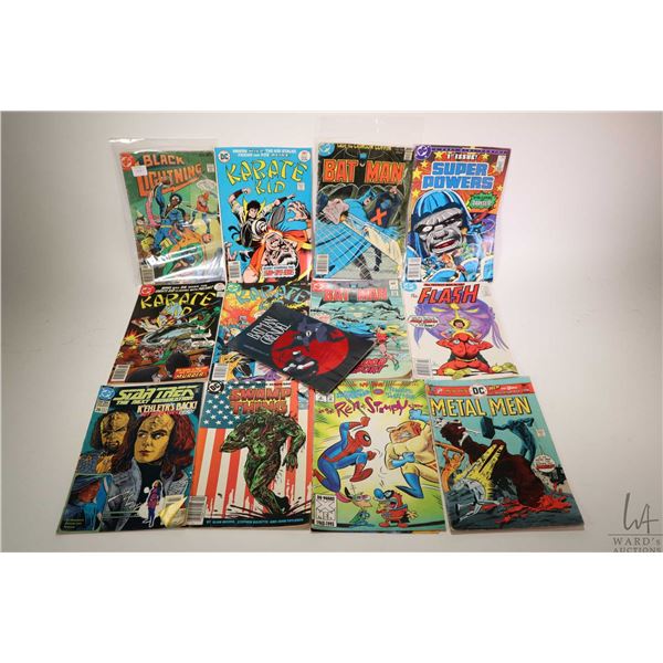 Selection of vintage DC comic books including "Batman, The Flash, Black Lightening, Karate Kid, Supe